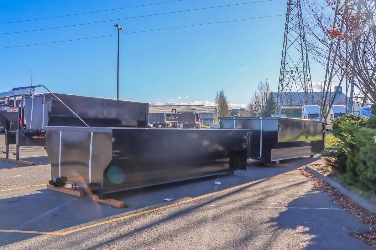 Roll-off dumpster ready for waste disposal at job site for 12 Yard Dumpster Rental in Conway